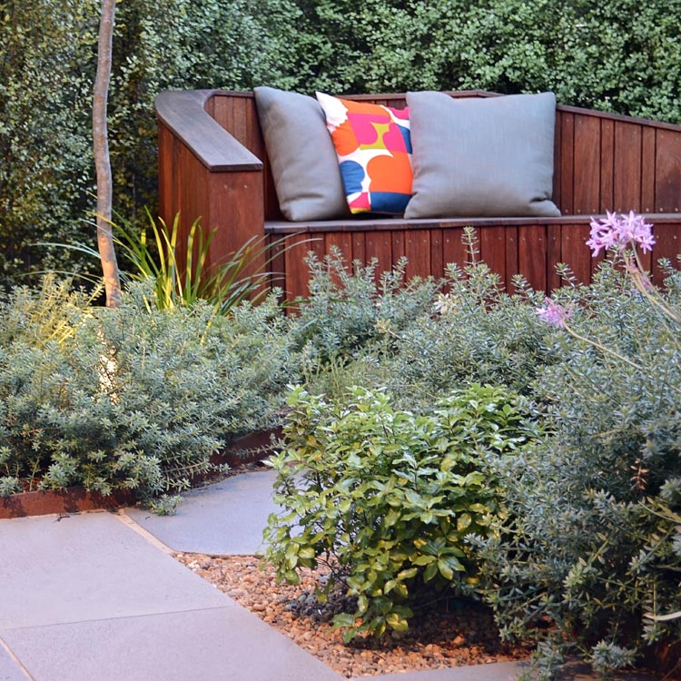 Bespoke timber seat with soft planting