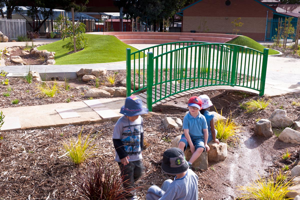 Children playing in the gully bed