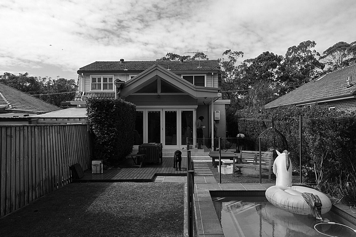 Before image of garden with house